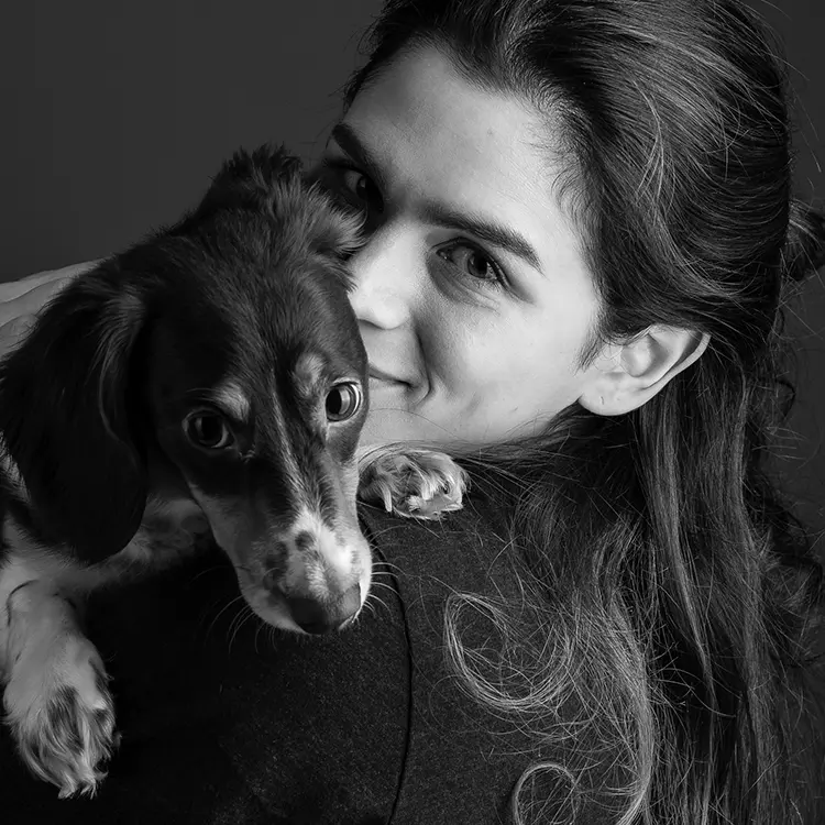 woman holding her dog portrait