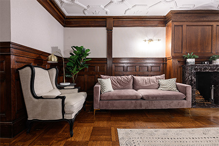 room with armchair and sofa